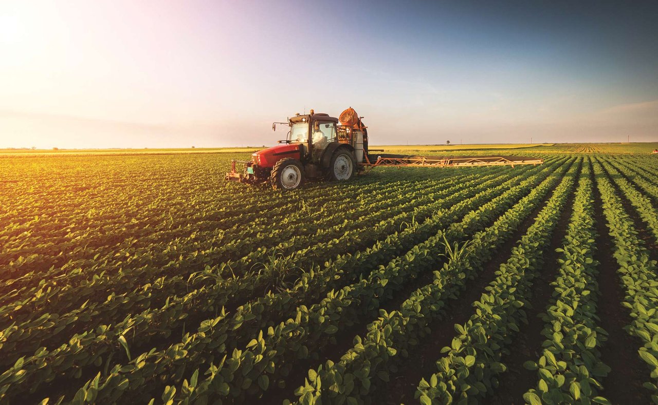 Image of tractor in a field